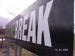 Welcome Break logo sign.