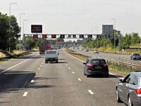 Electronic signs over motorway.