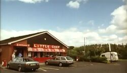 Little Chef building with red and white awning.