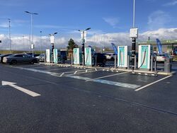 Six charging points in a car park.