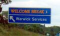 Welcome Break road sign.