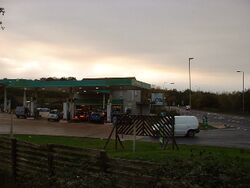 A BP forecourt with an old-style thick canopy.