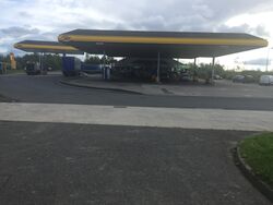 Petrol station with Jet branding and a brick canopy.