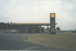 Old picture of a Shell forecourt.