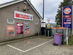 An InstaVolt electric vehicle charger, pictured next to a SPAR store.