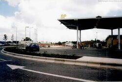 Petrol station with a thin canopy and a sign saying BP.