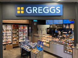 Greggs concession inside a shop.