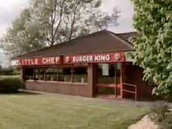 Little Chef and Burger King signs on a building.