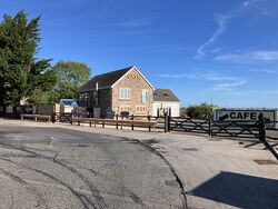 A two-storey café building.