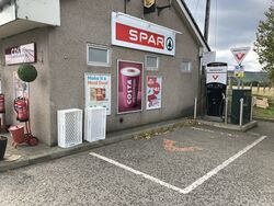 An InstaVolt electric vehicle charger, pictured next to a SPAR store.