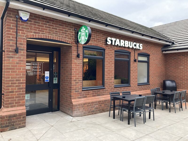 File:Starbucks entrance Buckingham 2023.jpg