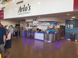 Counter with a sign saying Arlo's pantry and kitchen.
