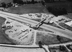 Aerial view of a motorway service area.